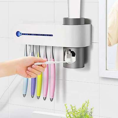 Tooth brush Sanitizer Toothpaste Dispenser with 5 Toothbrush Holder Wall Mounted with Sticker for Women Kids Baby Bathroom